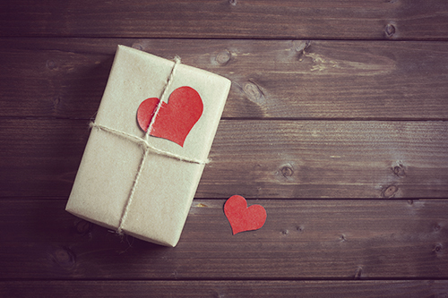 gift for Valentine's Day with red hearts