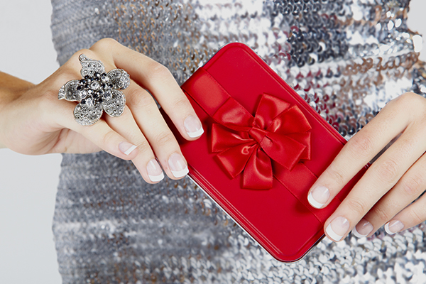 red gift box woman's hands