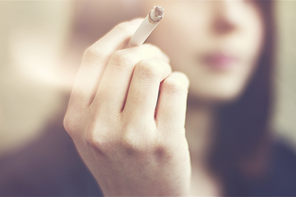 woman smoking a cigarette