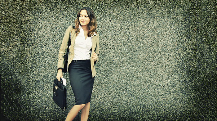 Professional woman in skirt and blazer