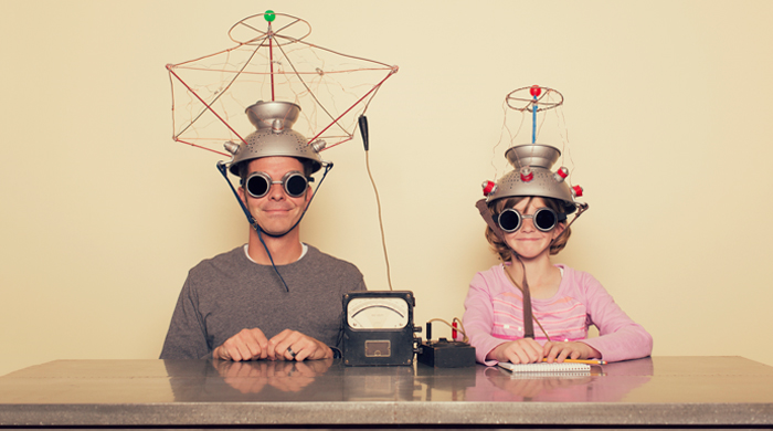 Dad and daughter experimenting with electronics