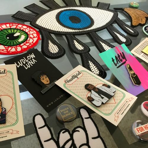 Iron on patches laid out on glass table