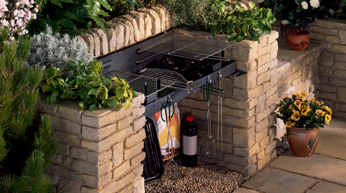 Brick barbecue pit in back yard