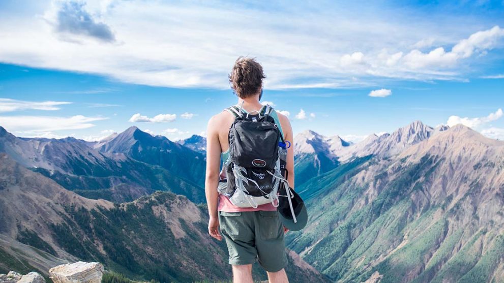 Man overlooking mountains