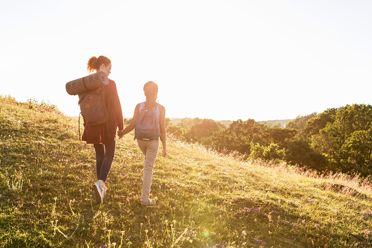 Mother and daughter walking