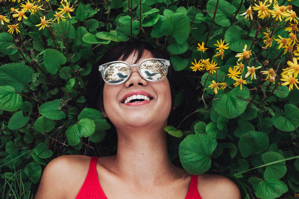 Girl laying in plants