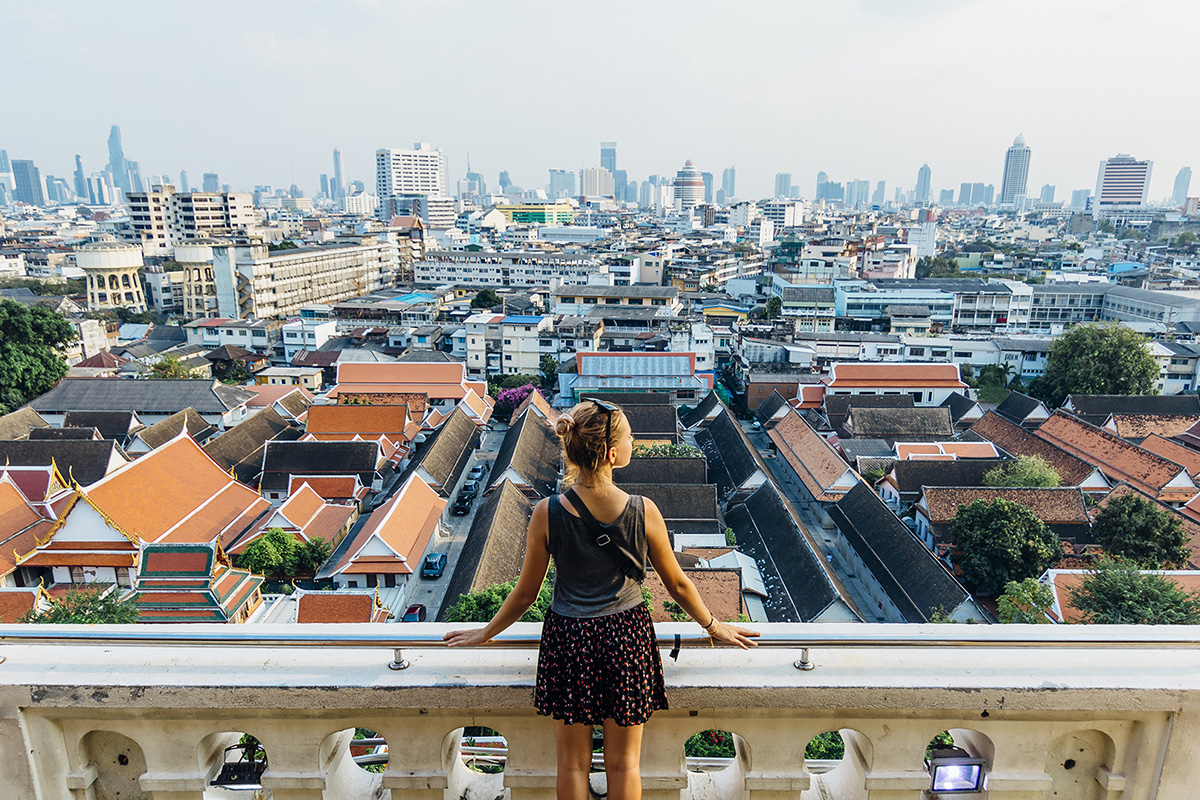 Woman overlooking a city