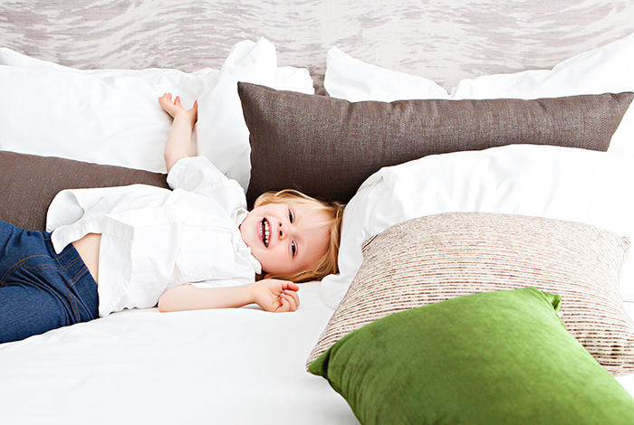 Kid on a bed