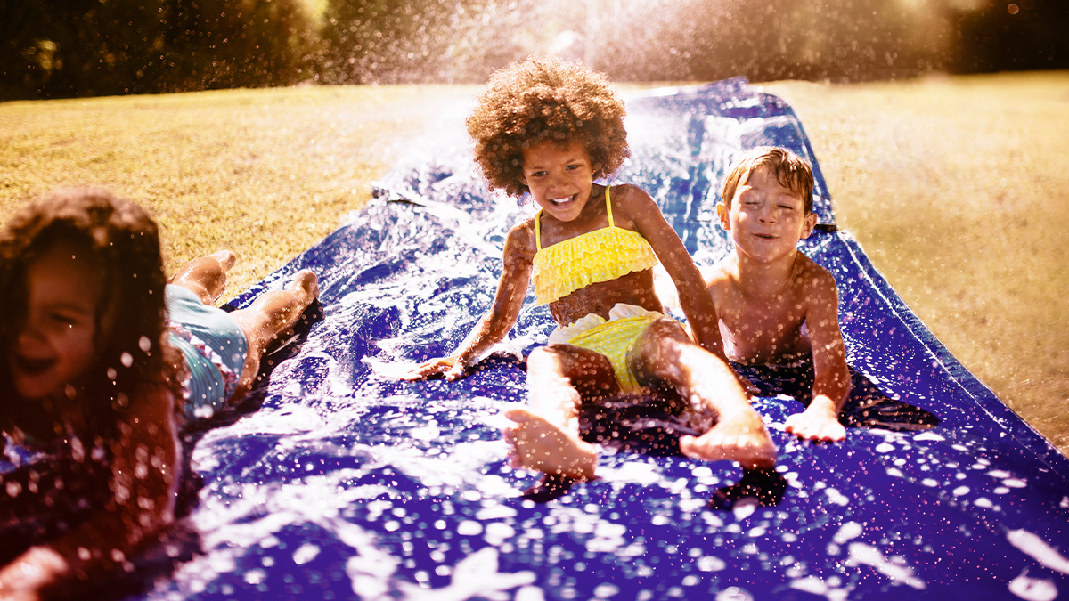 Kids on slip n slide