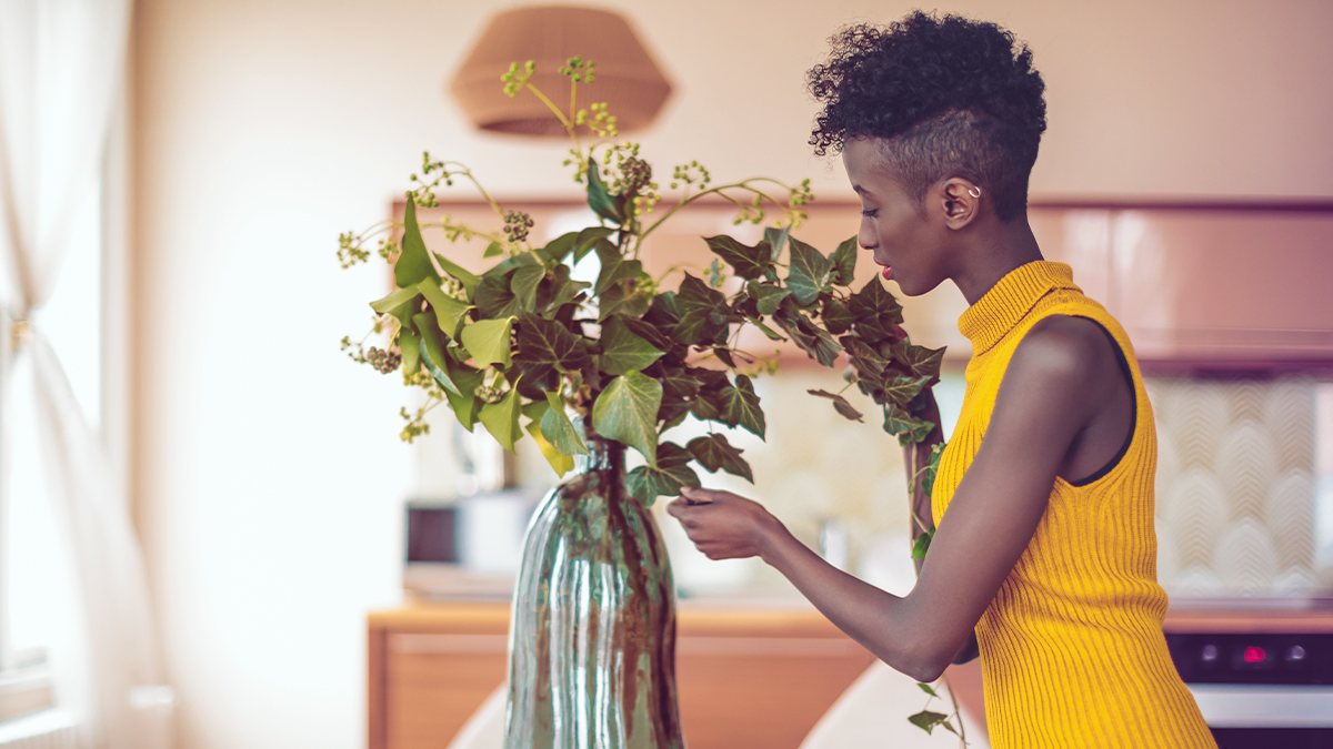 Woman arranging flowers