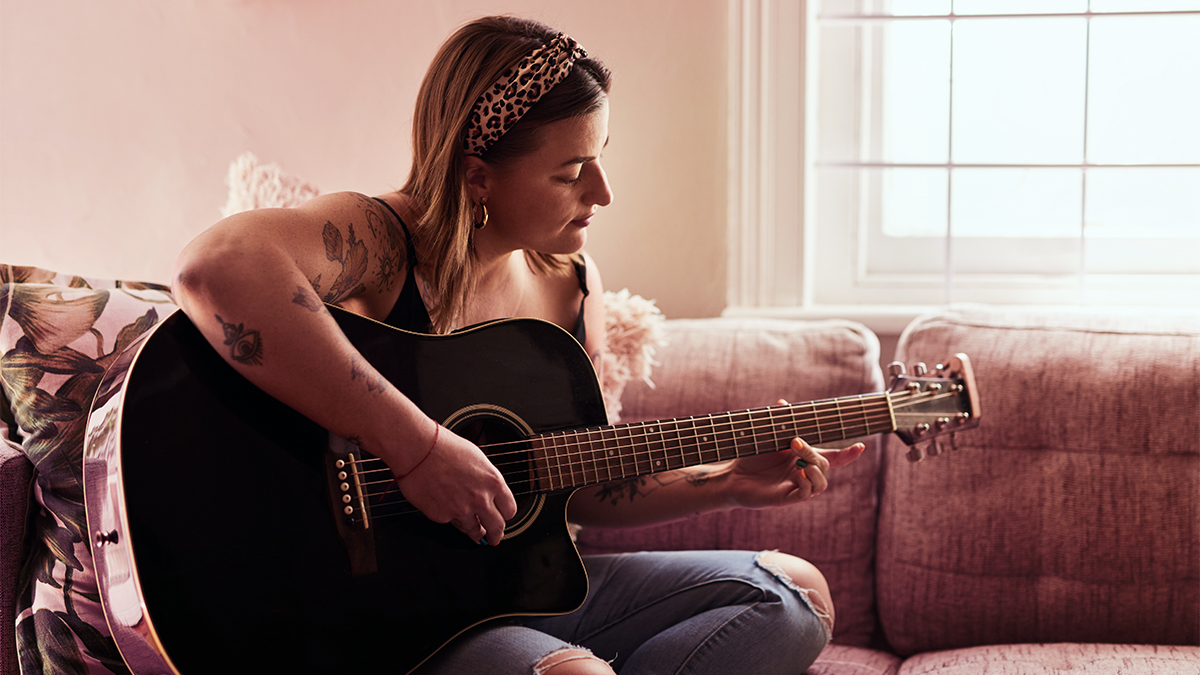 Girl playing guitar