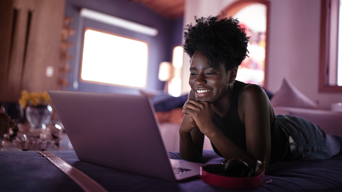 Girl looking at laptop
