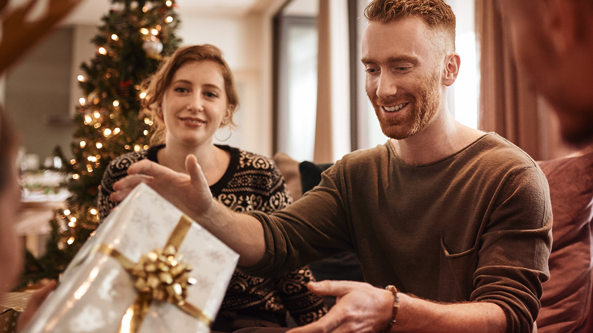 Guy receiving gift