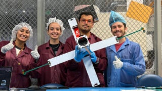 Team members and satellite