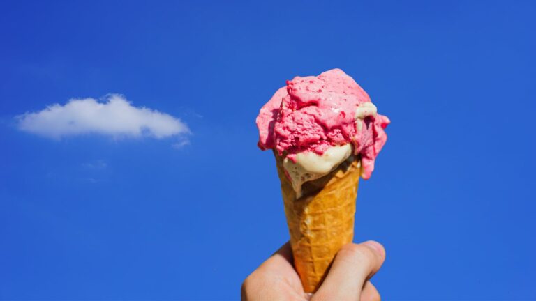 Hand holding ice cream cone